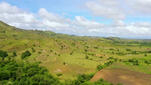 Green Hills and Blue Sky with Clouds Beautiful Landscape on the Island of Luzon Aerial View