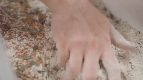 Mixing Flour and Seeds by Hand