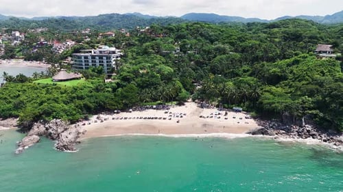 Tourists Enjoying Paradise Beach Los Muertos In Sayulita, Nayarit. Mexico