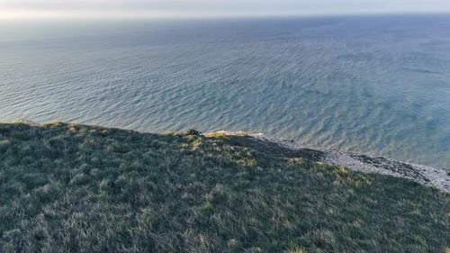 chute au sommet d'une falaise et découverte du phare