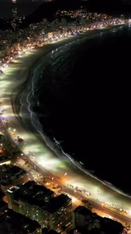 Night Scape of Copacabana Beach at downtown Rio de Janeiro Brazil.