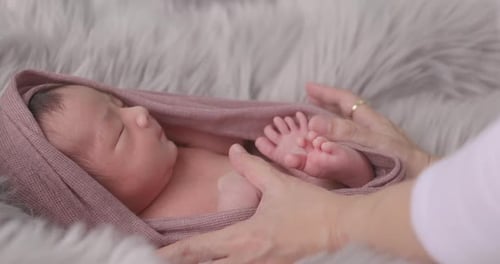 Close shot of a baby with a really peaceful face