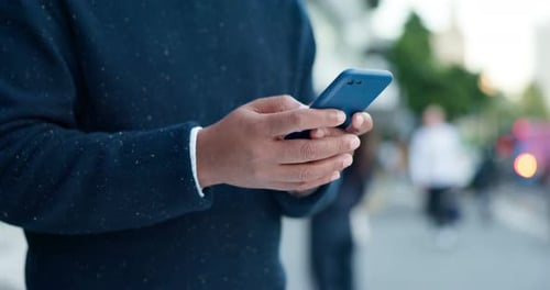 Business man, hands and typing on a phone outdoor in a city for communication, chat or networking