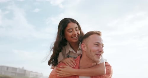 Outdoor, piggy back and couple with marriage, smile and fun with vacation