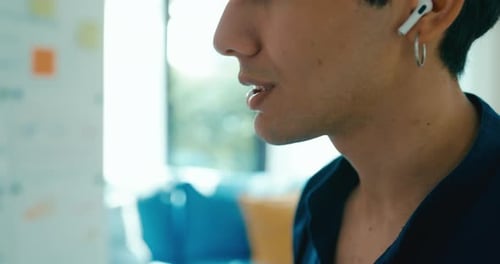 Asia male use laptop talk colleague in video call meeting on desk in living room at home office.