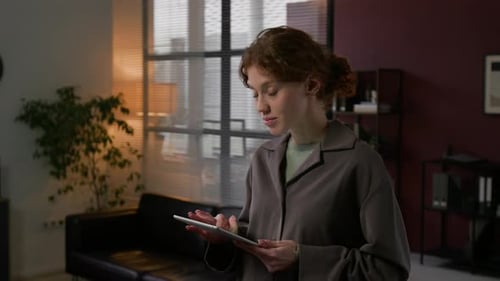 Cheerful Gen Z Woman With Digital Tablet In Hands