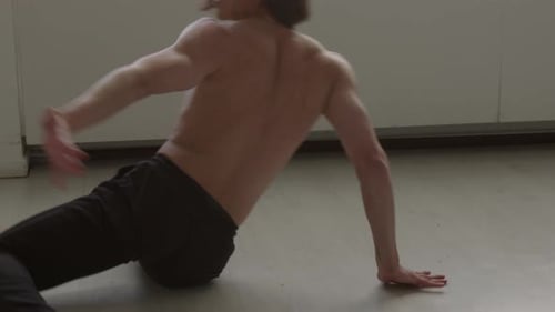 Shirtless Man Performing Contemporary Dance in Studio