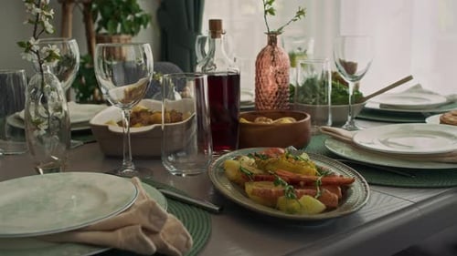 Table with Roast Dishes and Homemade Wine, Ready for Sunday Family Meal