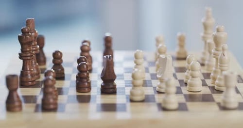 4k video footage of an unrecognizable person playing chess