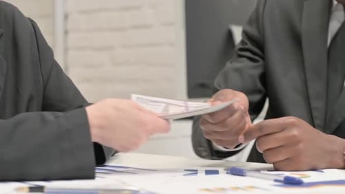 Close up of Woman Giving Money and Getting Home Keys from Businessman