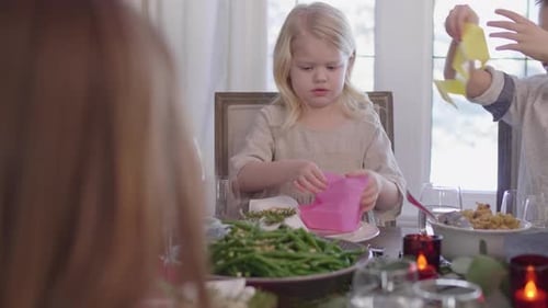 Family fun wearing christmas party hats during holiday celebration in Canada