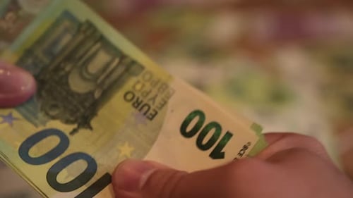 Exchanging Euro Currency Notes Close Up