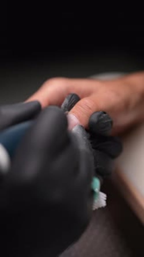 Close Up of Manicure with Electric File
