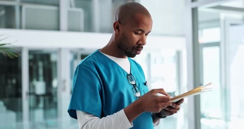 Nurse, black man and writing on document in hospital for healthcare report