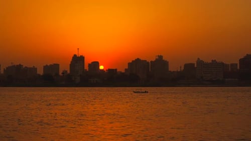 Sunset on the skyline of the city of Cairo, the sun goes down on the buildings of the city of Cairo