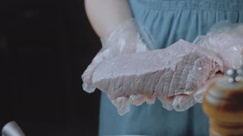 Raw Meat Being Prepared in the Kitchen