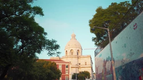 Lisbon Cathedral National Pantheon at typical square with traveling motion