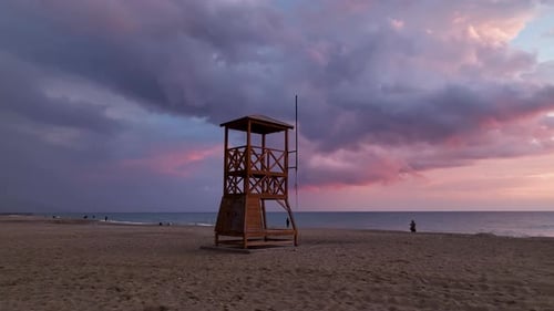 Rescue Tower on the Seashore Aerial View and a Very Beautiful Sunset