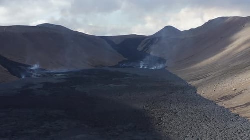 Natthagi valley with large black basalt flood from active volcano