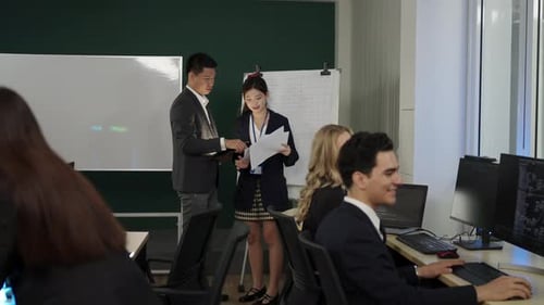 Group of programmers are coding at office.