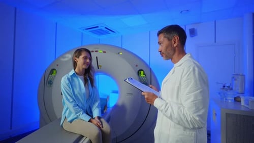 Medical Worker Explaining CT Scan Results to Patient in Hospital Setting MRI Machine and