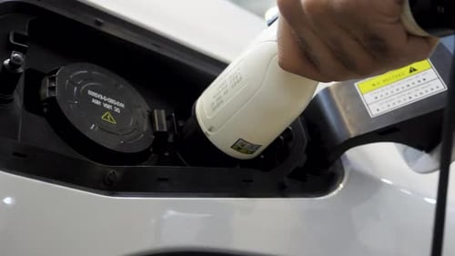 Electric Vehicle Charging with White Charging Cable