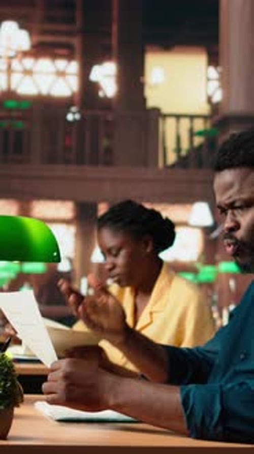Vertical Video African American College Student Struggling to Study Theoretical Notes