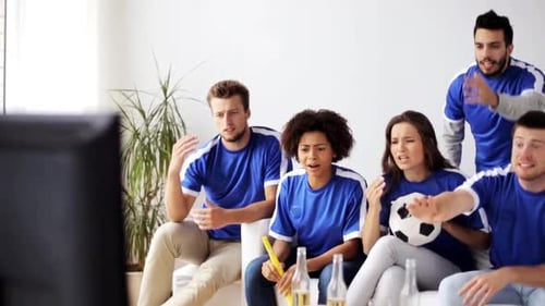 Friendship, Leisure, Sport, People and Entertainment Concept - Friends or Football Fans