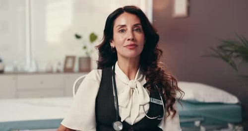 Happy woman, face and doctor with career in healthcare development or welfare at hospital