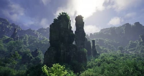 Majestic Rock Formations Tower Above Lush Green Landscape Under Bright Sky