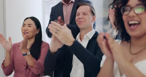 Diverse Group of People Applauding in Office