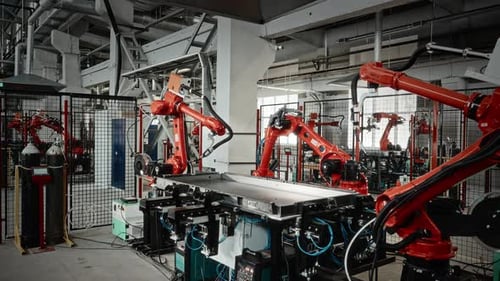 Robots Welding Continuously Multiple Automated Welding Stations Operate Seamlessly On Assembly Line