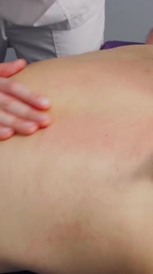 Massage Room Massage Therapy Back Massage of a Man in a Spa Salon Rest and Rehabilitation