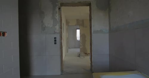 Walking through a construction site of a typical german one family house. Moving through rooms.