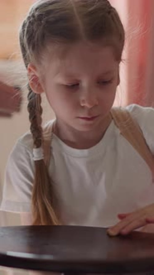 Calm Little Girl Turns Piano Stool By Synthesizer Piano