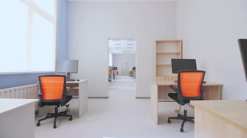 Modern Open Office with Desks and Computers