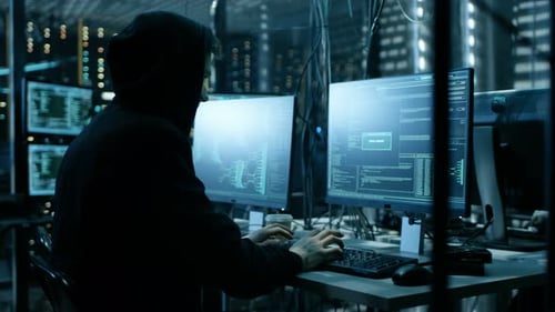 Hooded Hacker and His Group Break into Corporate Data Servers. Place Has Dark Atmosphere, Multiple