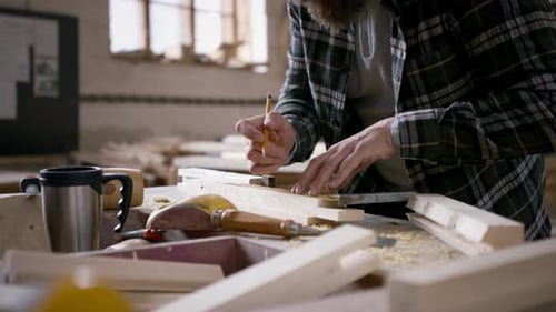 Close Up of Male Carpenter Working on His Product. Small Business Concept