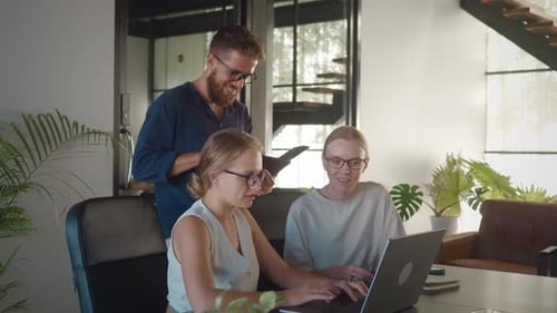 Ux Designer and Web Developer Two Women and Man are Working Together in Contemporary Office Space