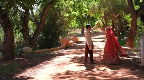 Elegant Couple Celebrating Their Wedding in Nature