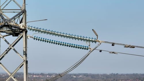 Close Up View of Industrial High Voltage Lattice Power Line Tower
