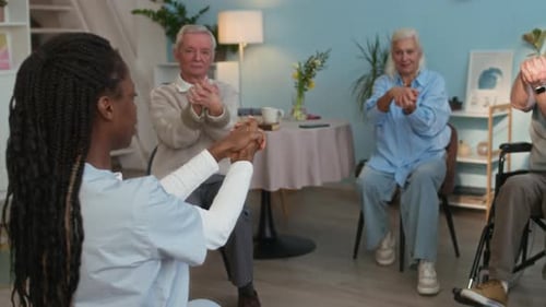 Chair Exercises with Caregiver in Nursing Home