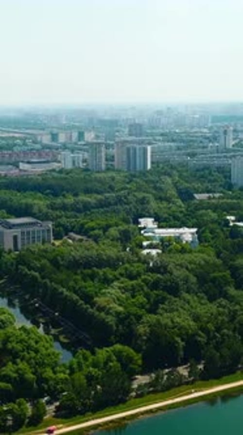 Top View of City with Dam and River on Sunny Summer Day Creative Beautiful Green City with Dam and