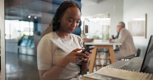 Texting, employee and woman with smartphone in cubicle, privacy or laughing at funny post in office