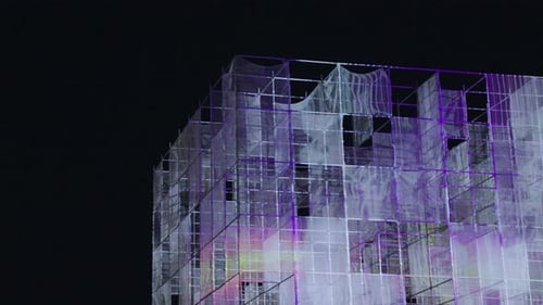 Building With Scaffolding Lit Up at Night