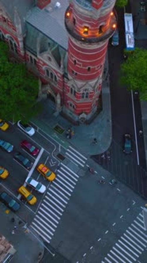 Many cars stopped at the crossroads waiting their turn to move. Busy traffic streets of New York