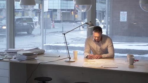Designer Working on Plans in Studio Achievement