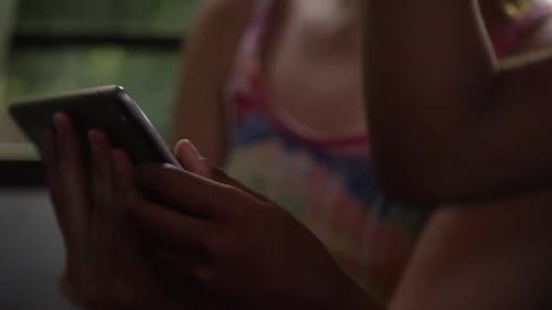 kids on the school bus - Close up playing tablet game kids