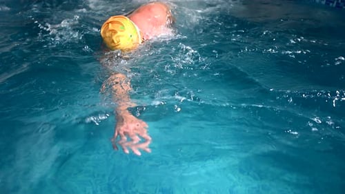 Underwater View of Professional Swimmer Training in Swimming Pool 120 Fps Super Slow Motion Raw
