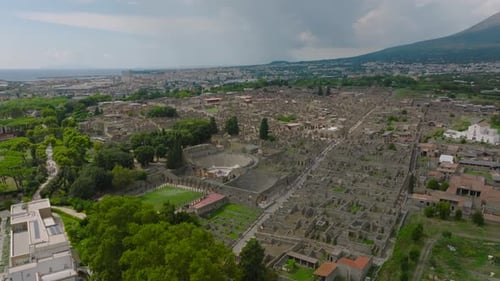Aerial Descending Footage of Large Historic Site of Ancient City Remains
